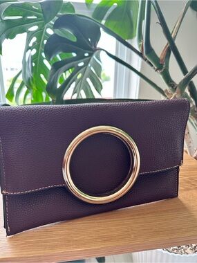 XOXO Dark Brown Pebbled Leather Clutch with Gold Ring Accent